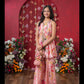 Floral Elegance: A Chic Peplum Set With Matching Potli For Festive Charm