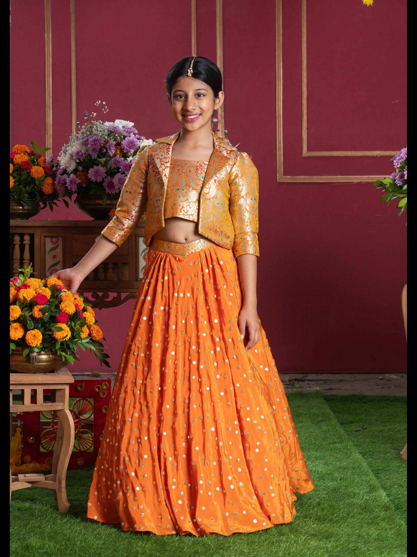 Orange Brocade Jacket Style Top And Lehenga